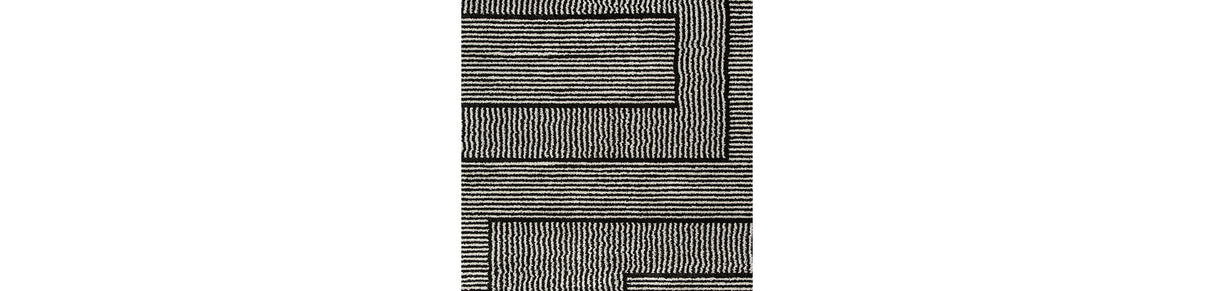 Kurtmen Black/Ivory Large Rug from Ashley Furniture - Luna Furniture