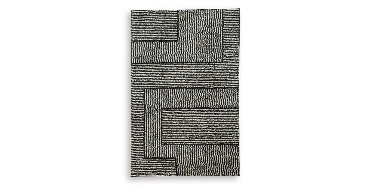 Kurtmen Black/Ivory Medium Rug from Ashley Furniture - Luna Furniture