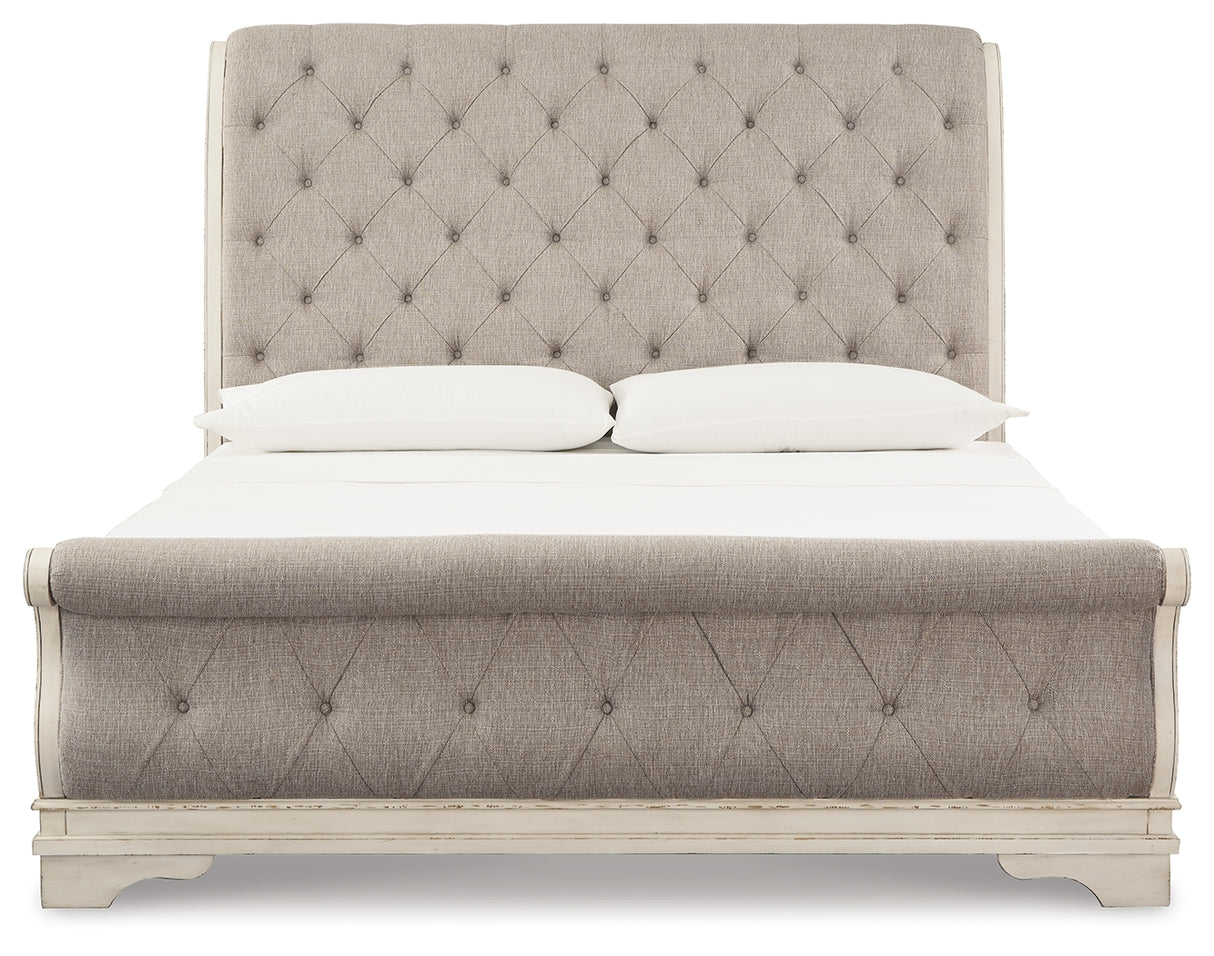 Realyn Two-tone Queen Upholstered Sleigh Bed and Chest from Ashley Furniture - Luna Furniture