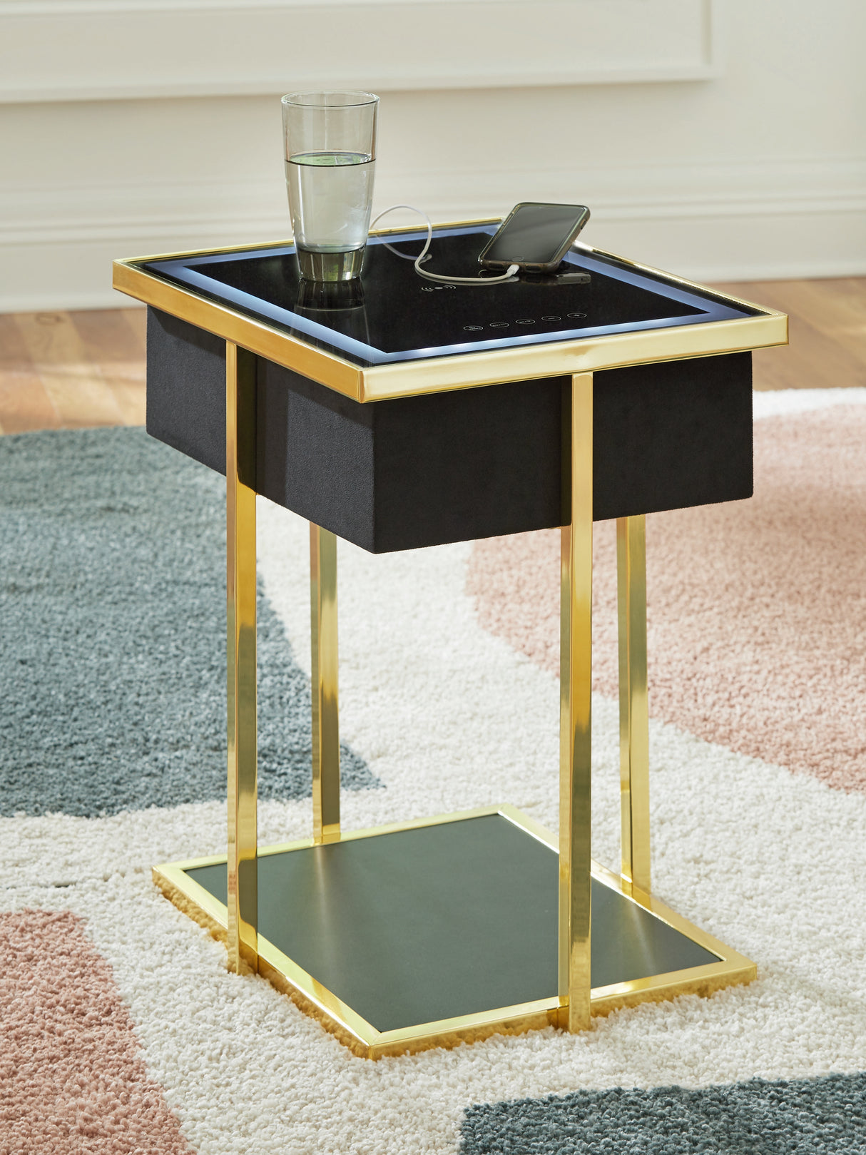 Rexwell Black/Gold Finish Accent Table with Speaker from Ashley - Luna Furniture