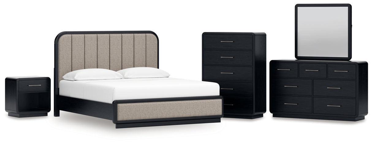 Rowanbeck California King Upholstered Panel Bed with Mirrored Dresser, Chest and Nightstand in Gray/Black from Ashley - Luna Furniture