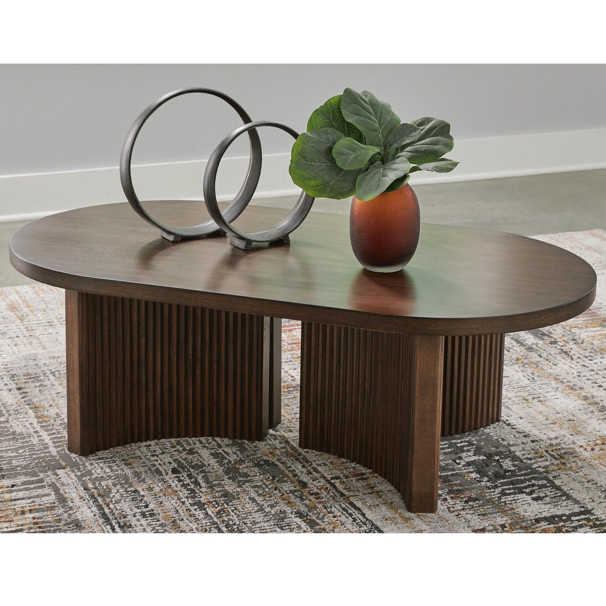 Korestone Dark Brown Coffee Table from Ashley - Luna Furniture
