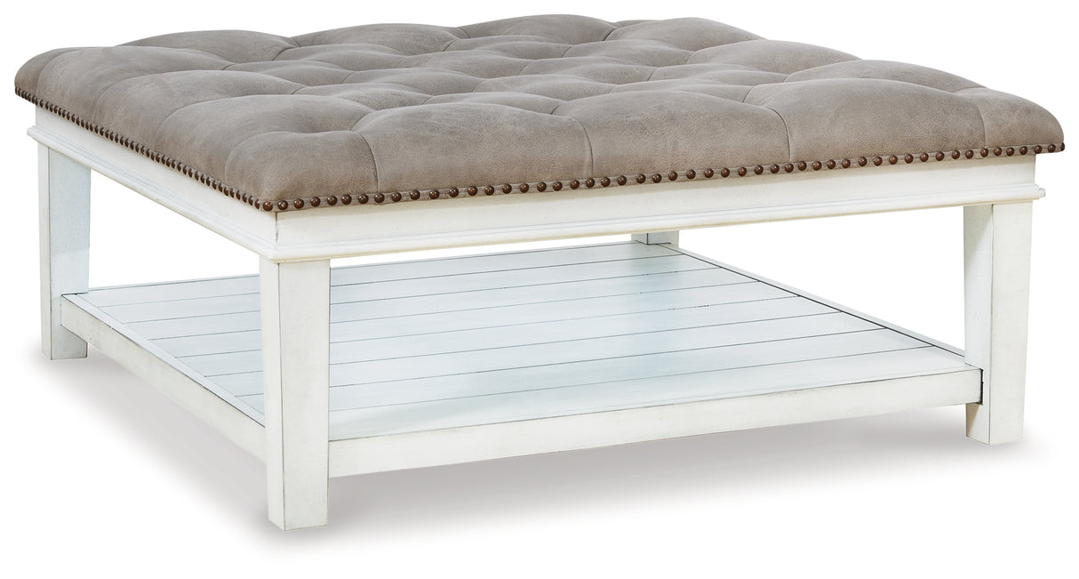 Kanwyn Whitewash Upholstered Ottoman Coffee Table from Ashley Furniture - Luna Furniture