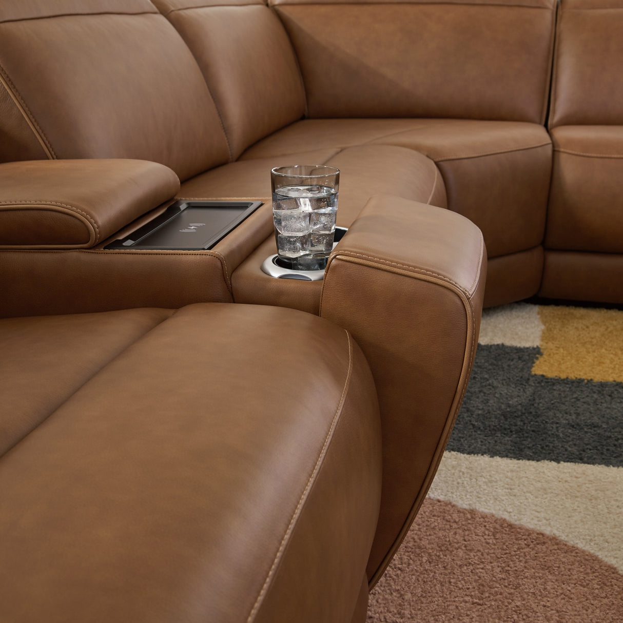 Magic Man Caramel 5-Piece Power Reclining Sectional with Console from Ashley Furniture - Luna Furniture