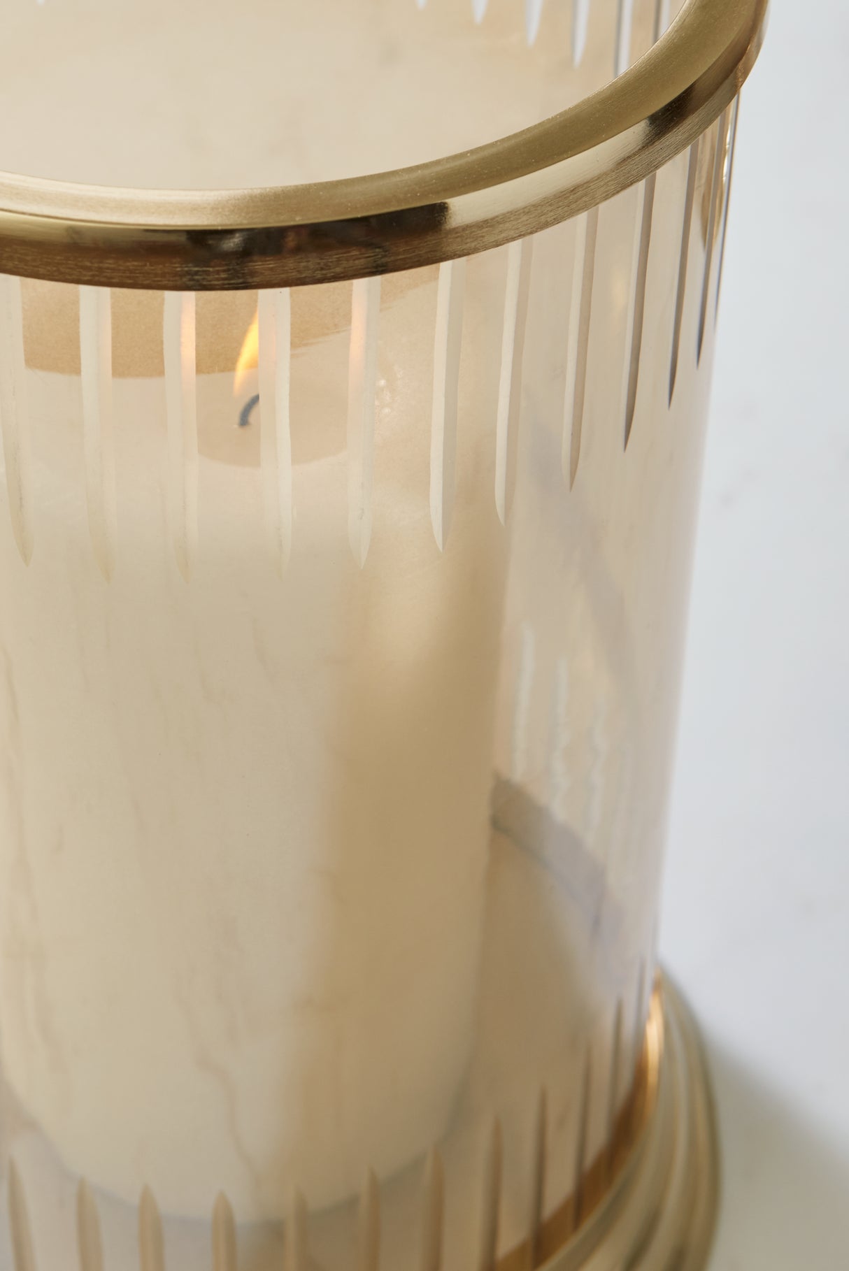 Aavinson Amber/Gold Finish Candle Holder from Ashley - Luna Furniture