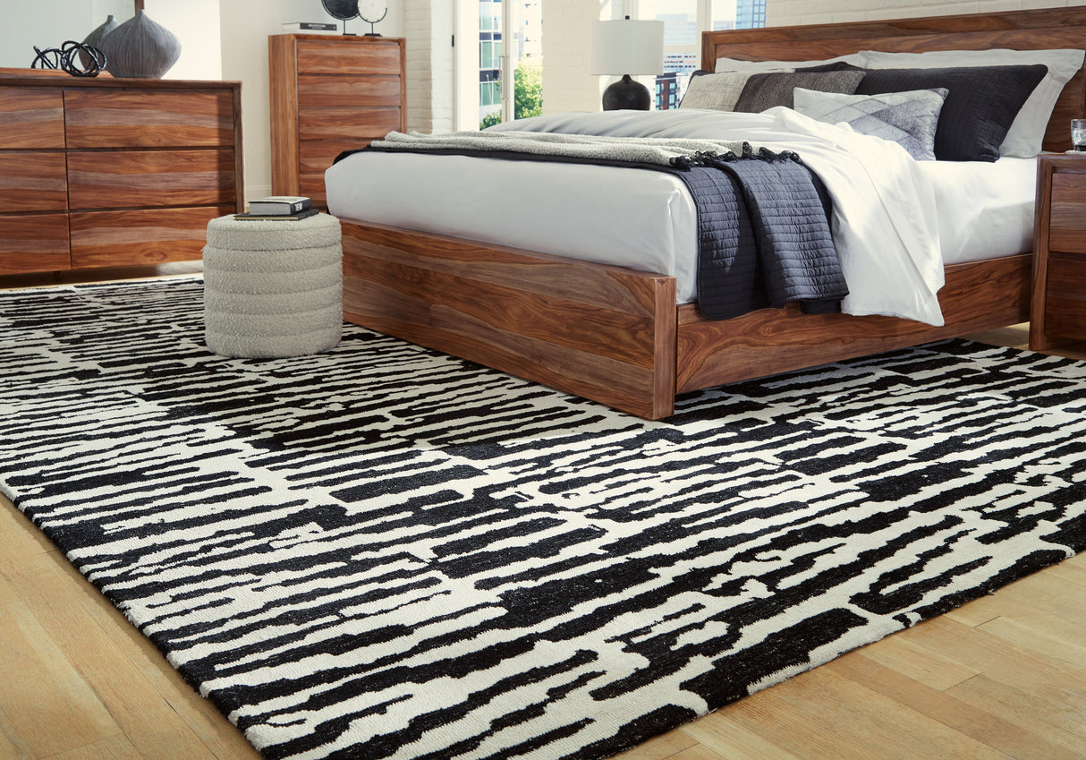 Bramshaw Black/Ivory Extra Large Rug from Ashley - Luna Furniture
