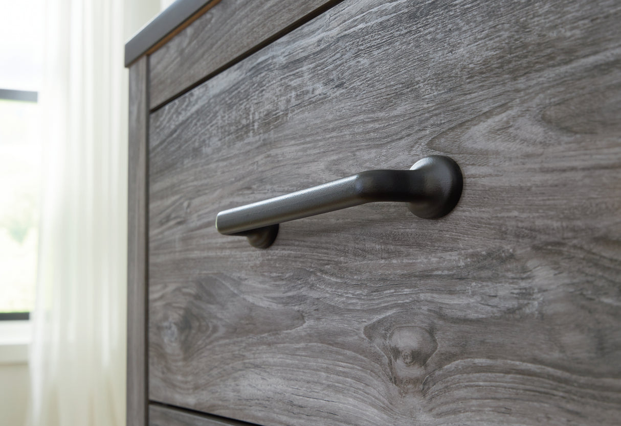 Bronyan King Panel Bed with Dresser in Dark Gray from Ashley - Luna Furniture