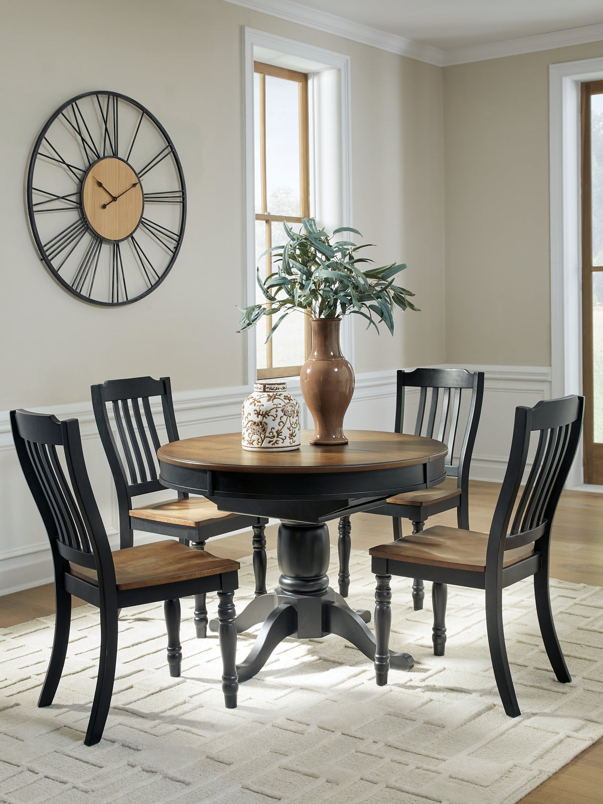 Clorazi Black/Brown Round Oval Extendable Dining Room Set from Ashley - Luna Furniture