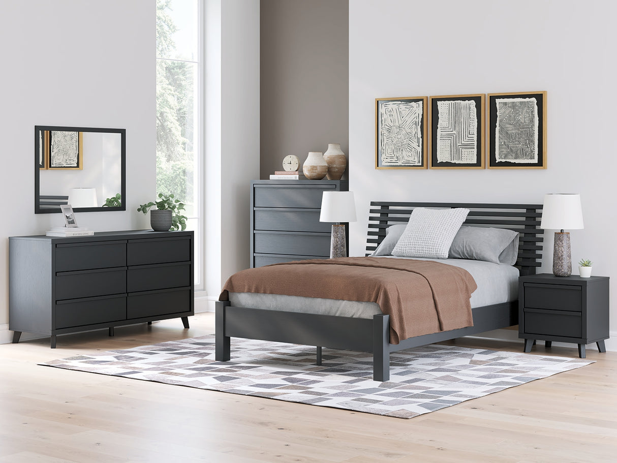 Danziar Queen Panel Headboard with Mirrored Dresser, Chest and Nightstand in Black from Ashley - Luna Furniture