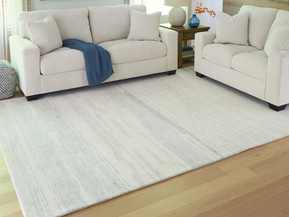 Genemost Ivory/Blue Large Rug from Ashley Furniture - Luna Furniture