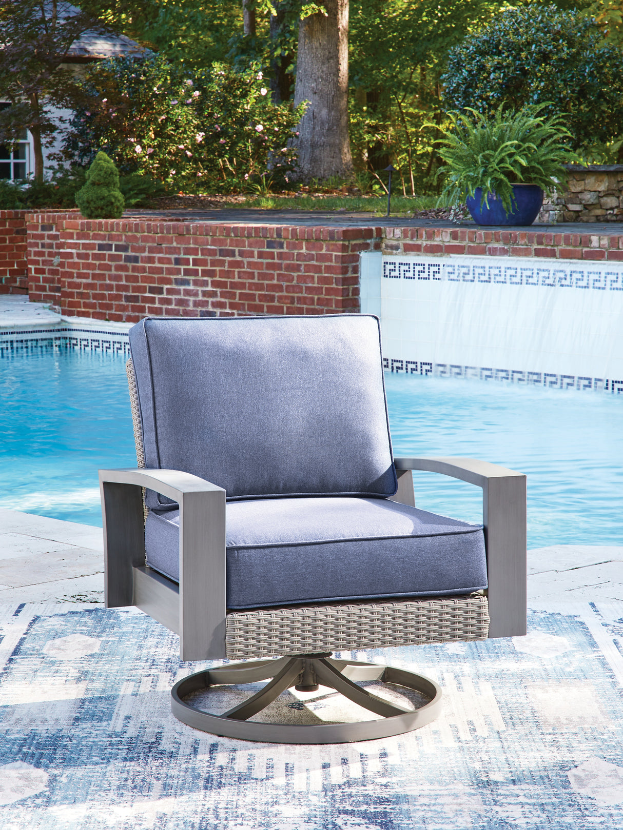 Half Moon Beach Blue/Gray Outdoor Swivel Lounge Chair with Cushion from Ashley - Luna Furniture