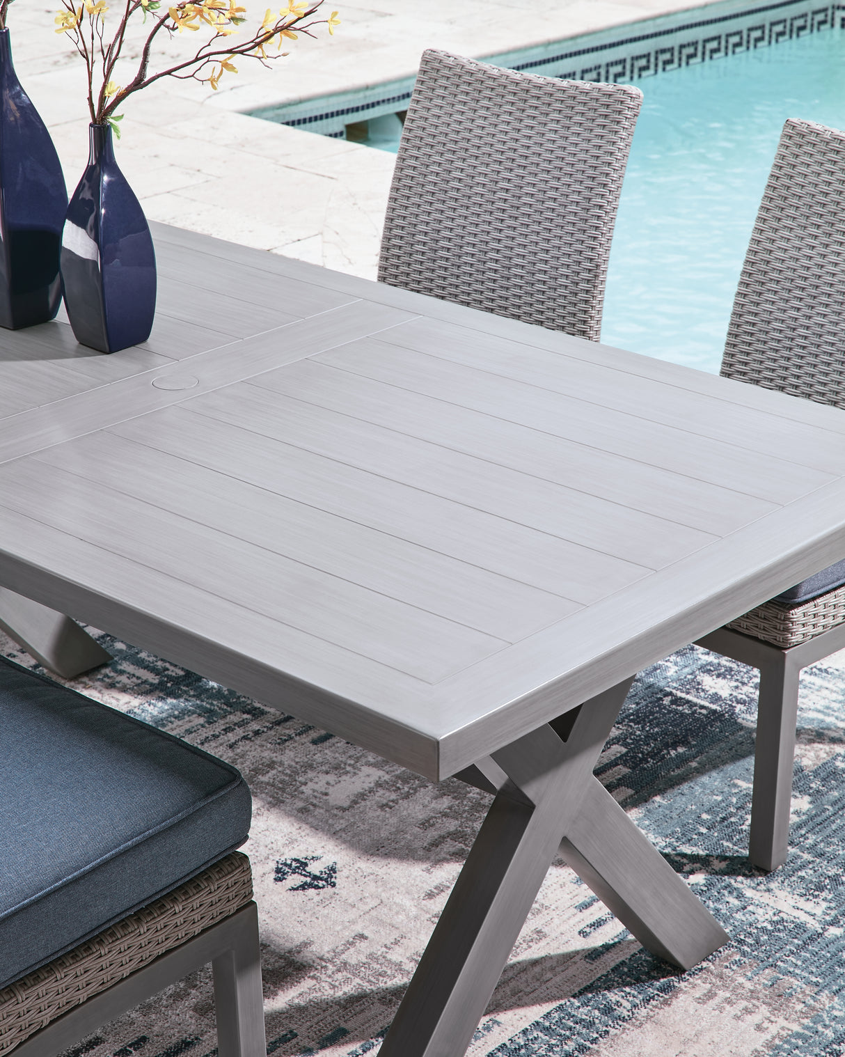 Half Moon Beach Outdoor Dining Table and 6 Chairs in Gray from Ashley - Luna Furniture