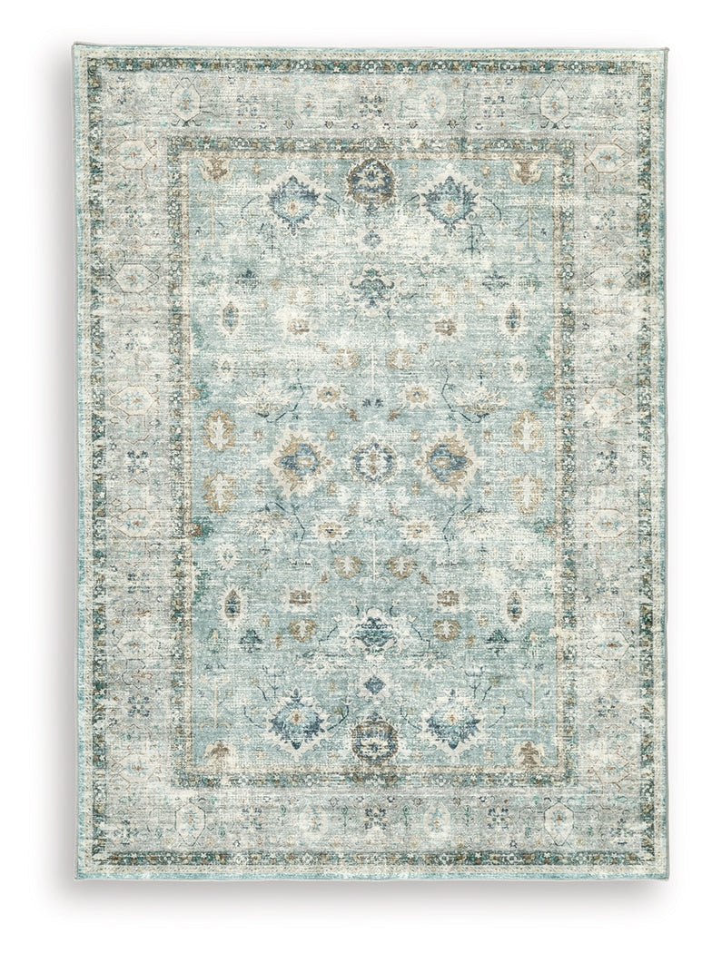 Ladstoney Teal/Beige/Ochre Medium Rug from Ashley Furniture - Luna Furniture