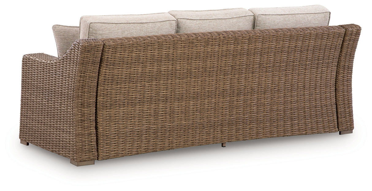 Laguna Heights Outdoor Sofa and Loveseat with Coffee Table in Beige from Ashley Furniture - Luna Furniture