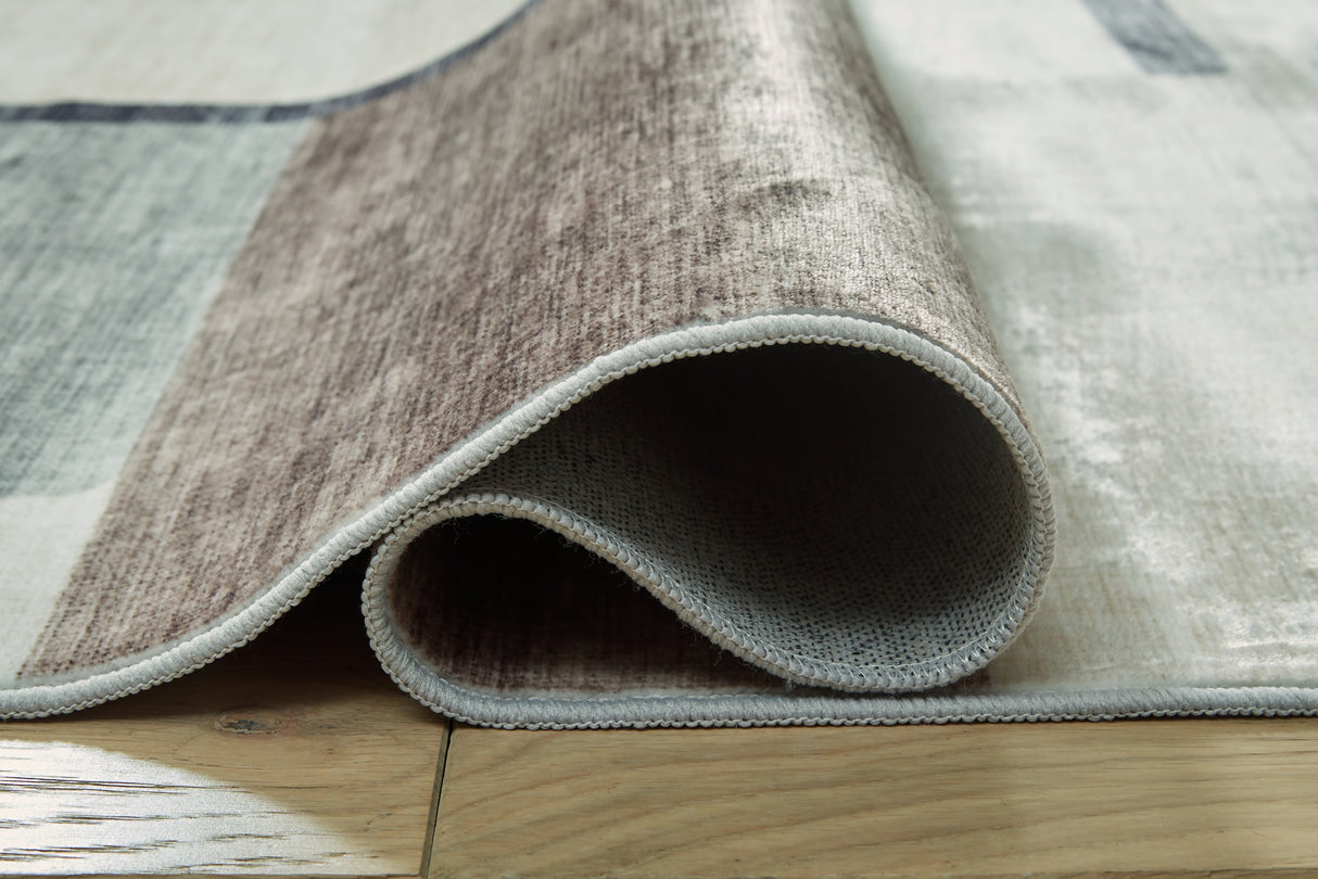 Larkport Cream/Brown/Gray Washable Medium Rug from Ashley - Luna Furniture