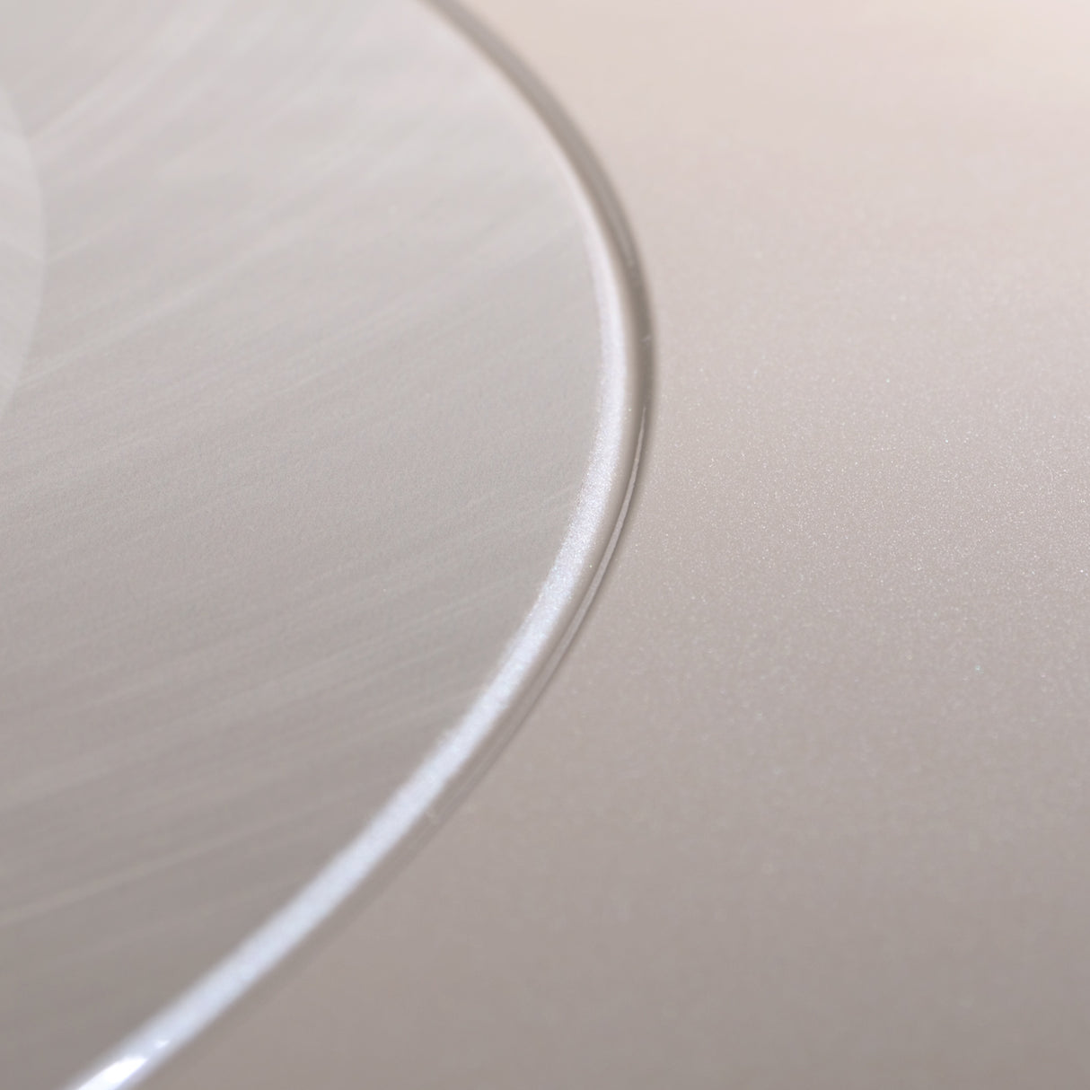 Carmela Shimmer Ivory Round Dining Table