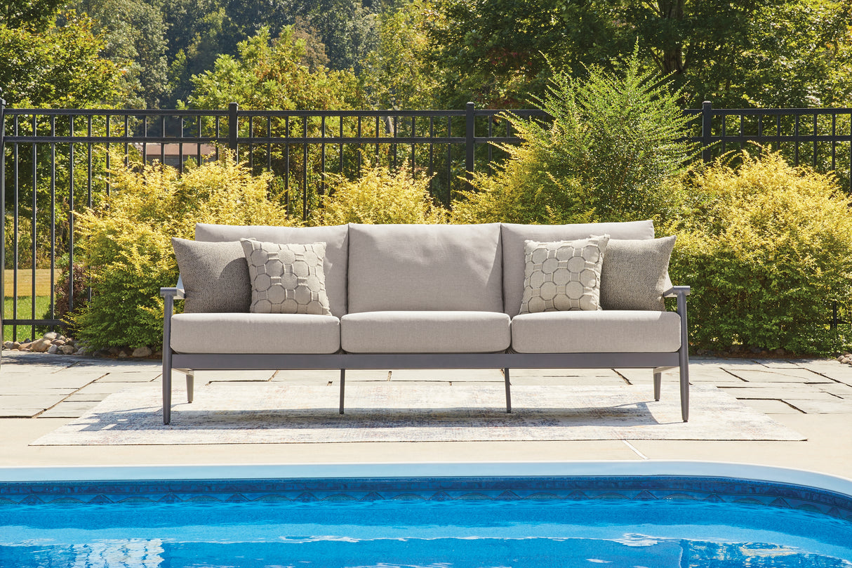 Ocean Beach Outdoor Sofa and Loveseat with Coffee Table in Gray from Ashley Furniture - Luna Furniture
