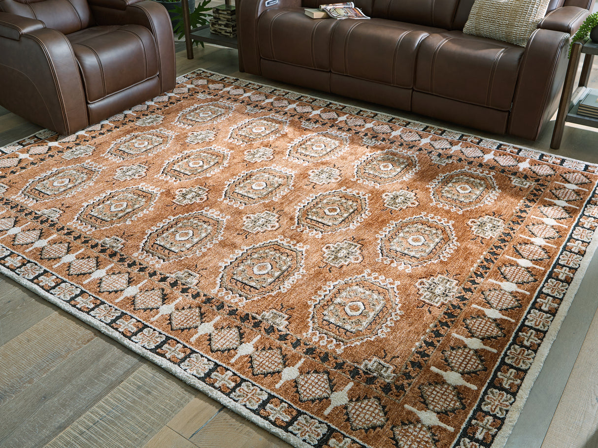 Qaabiz Sienna/Ivory/Black Large Rug from Ashley Furniture - Luna Furniture