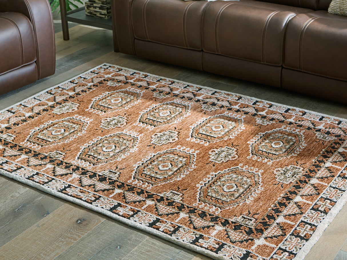 Qaabiz Sienna/Ivory/Black Medium Rug from Ashley Furniture - Luna Furniture