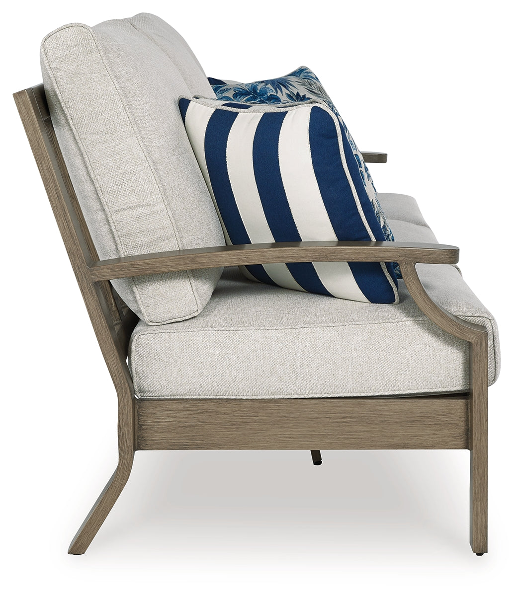 Rainier Ranch Outdoor Sofa and Loveseat with Coffee Table in Brown/Beige from Ashley Furniture - Luna Furniture