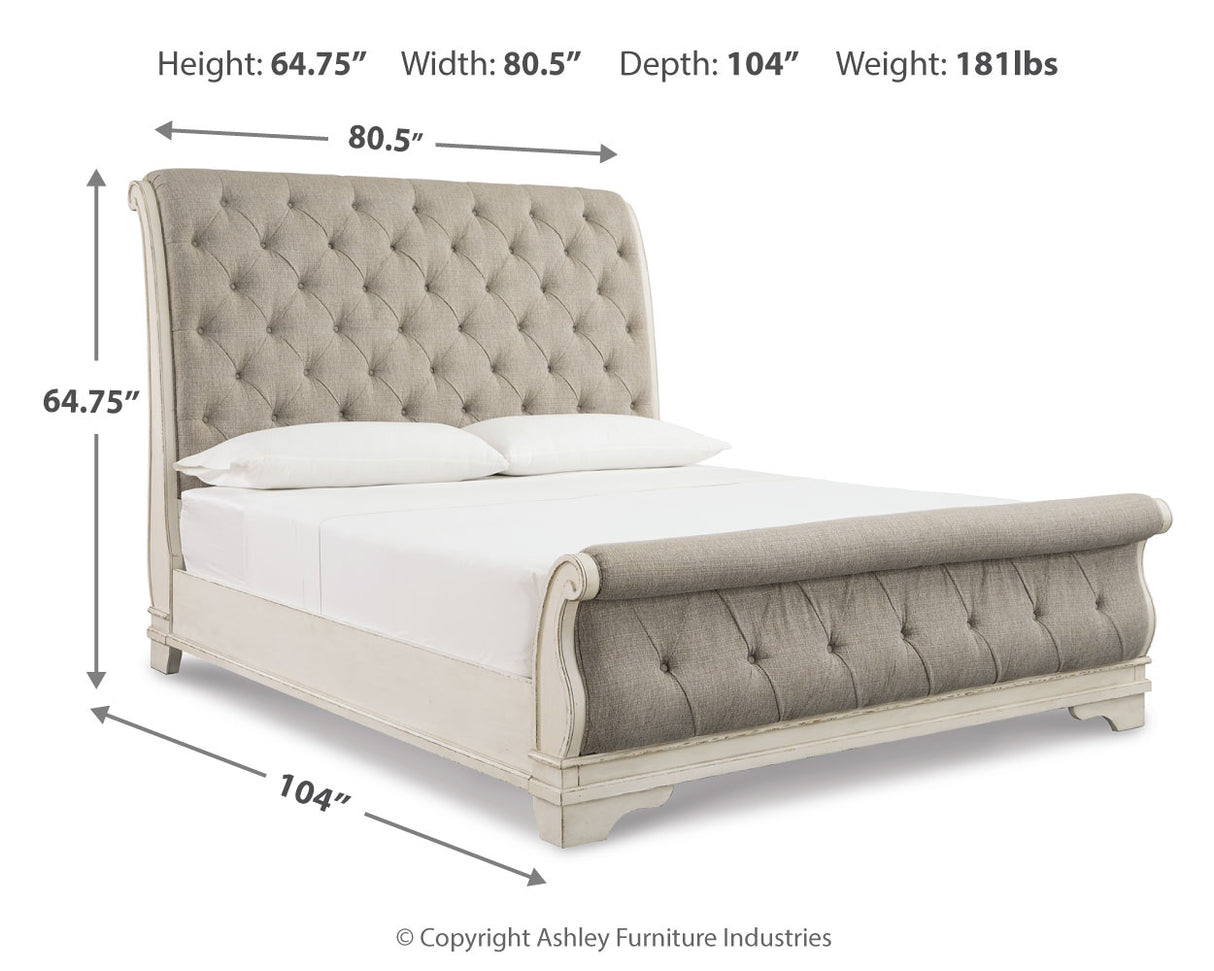 Realyn Two-tone Queen Upholstered Sleigh Bed and Chest from Ashley - Luna Furniture