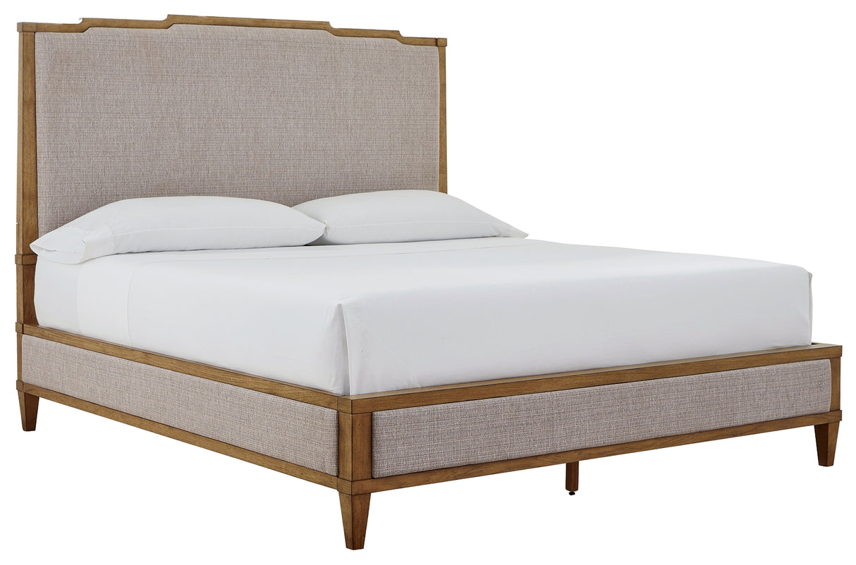 Sharlance California King Upholstered Panel Bed with Mirrored Dresser, Chest and 2 Nightstands in Light Brown from Ashley - Luna Furniture
