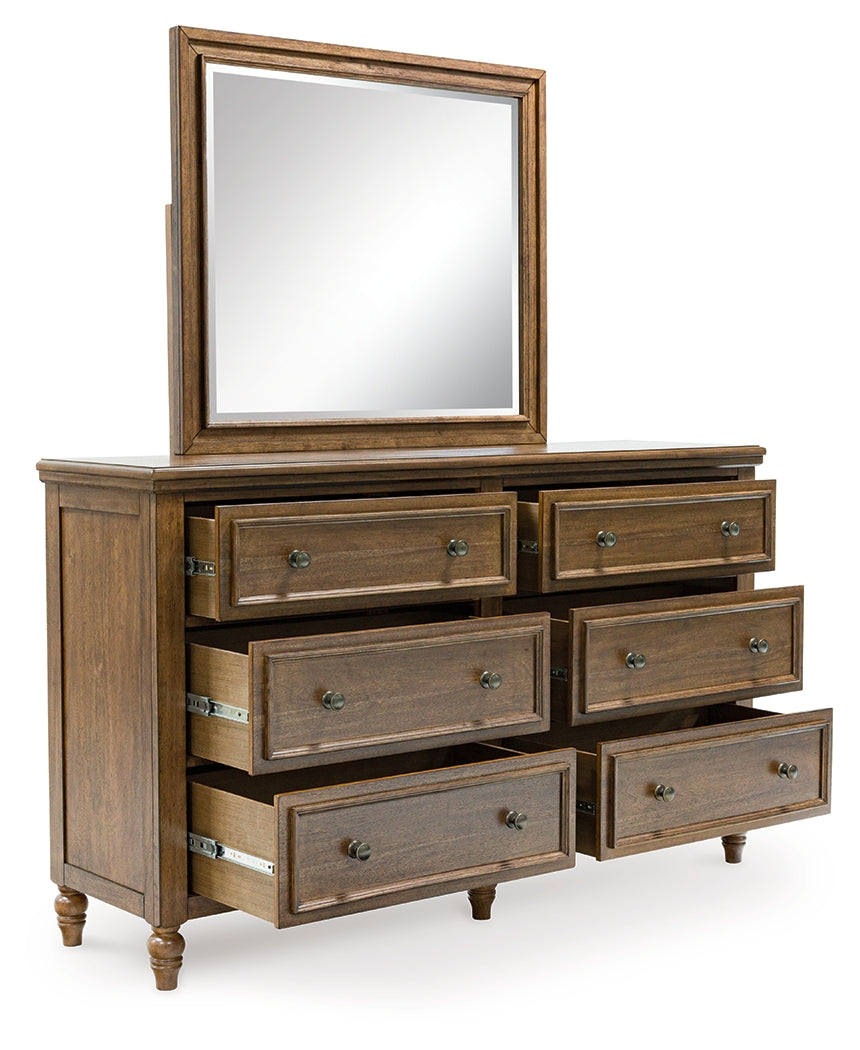 Sturlayne Queen Upholstered Panel Bed with Mirrored Dresser and Nightstand in Brown from Ashley - Luna Furniture