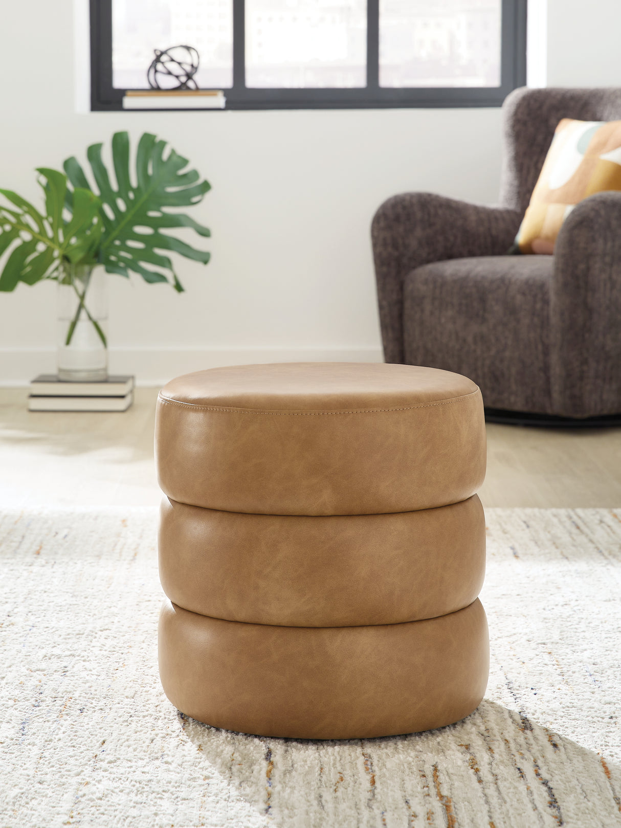 Ummi Caramel Swivel Accent Ottoman from Ashley - Luna Furniture