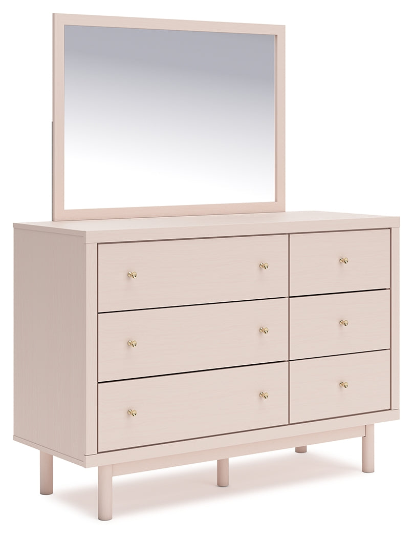 Wistenpine Twin Upholstered Panel Headboard with Mirrored Dresser in Blush from Ashley - Luna Furniture