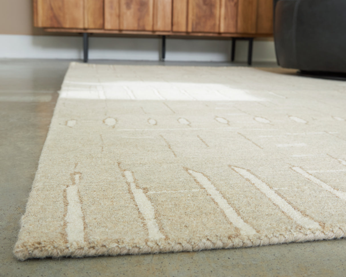Wolbert Tan/Ivory Medium Rug from Ashley - Luna Furniture