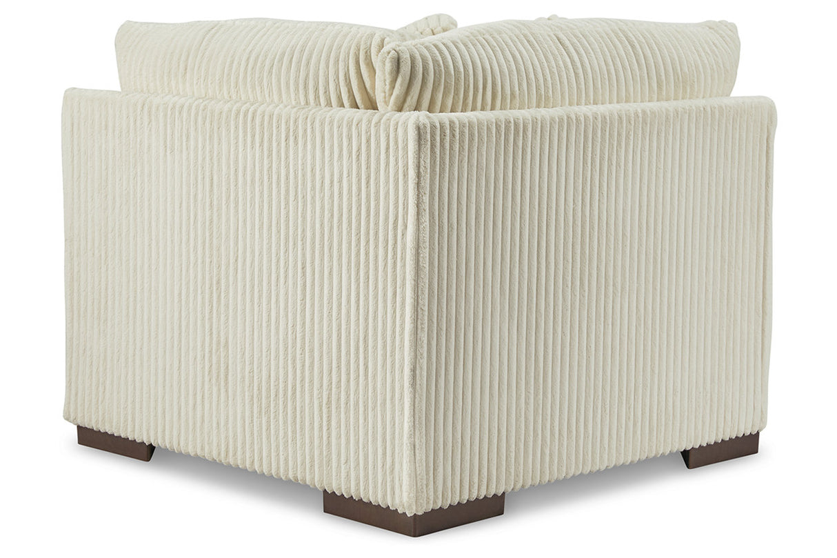 Lindyn Ivory Wedge from Ashley - Luna Furniture