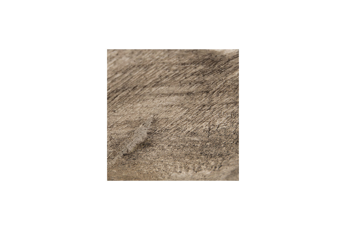 Dashburn Antique White/Black Sculpture from Ashley - Luna Furniture