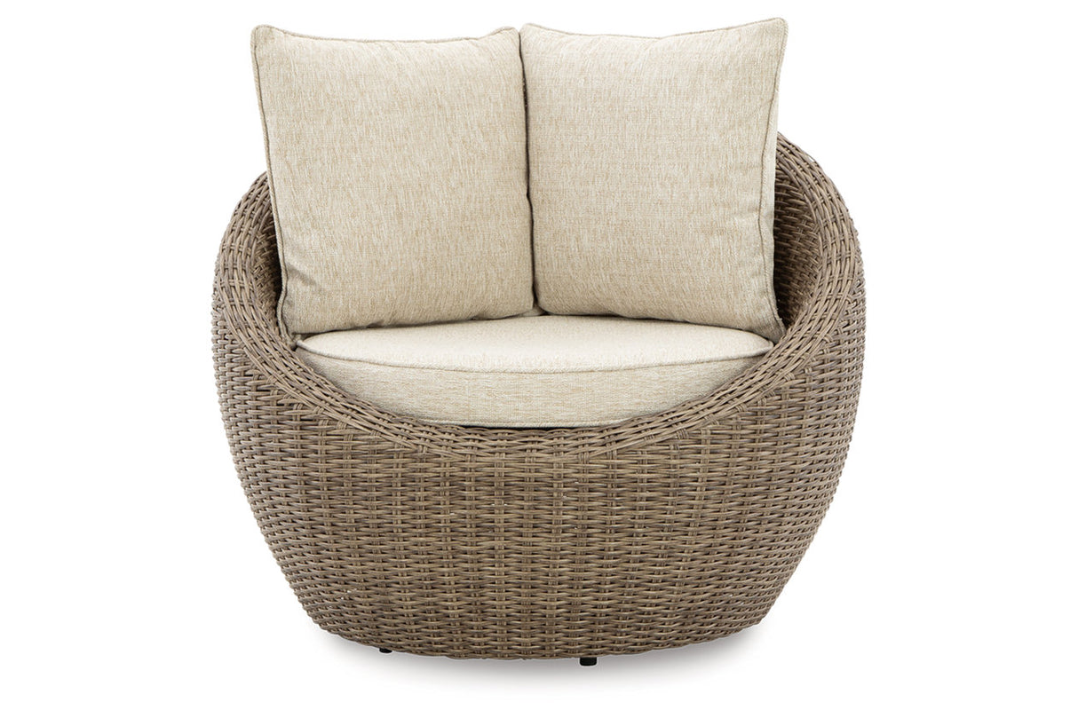 DANSON Beige Swivel Lounge with Cushion from Ashley Furniture - Luna Furniture