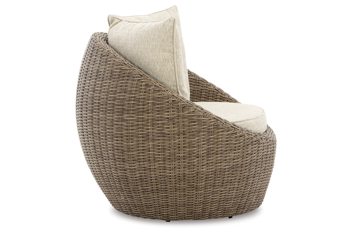 DANSON Beige Swivel Lounge with Cushion from Ashley Furniture - Luna Furniture