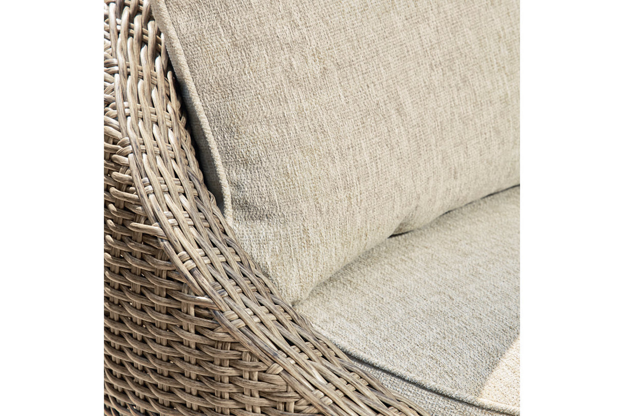 DANSON Beige Swivel Lounge with Cushion from Ashley Furniture - Luna Furniture