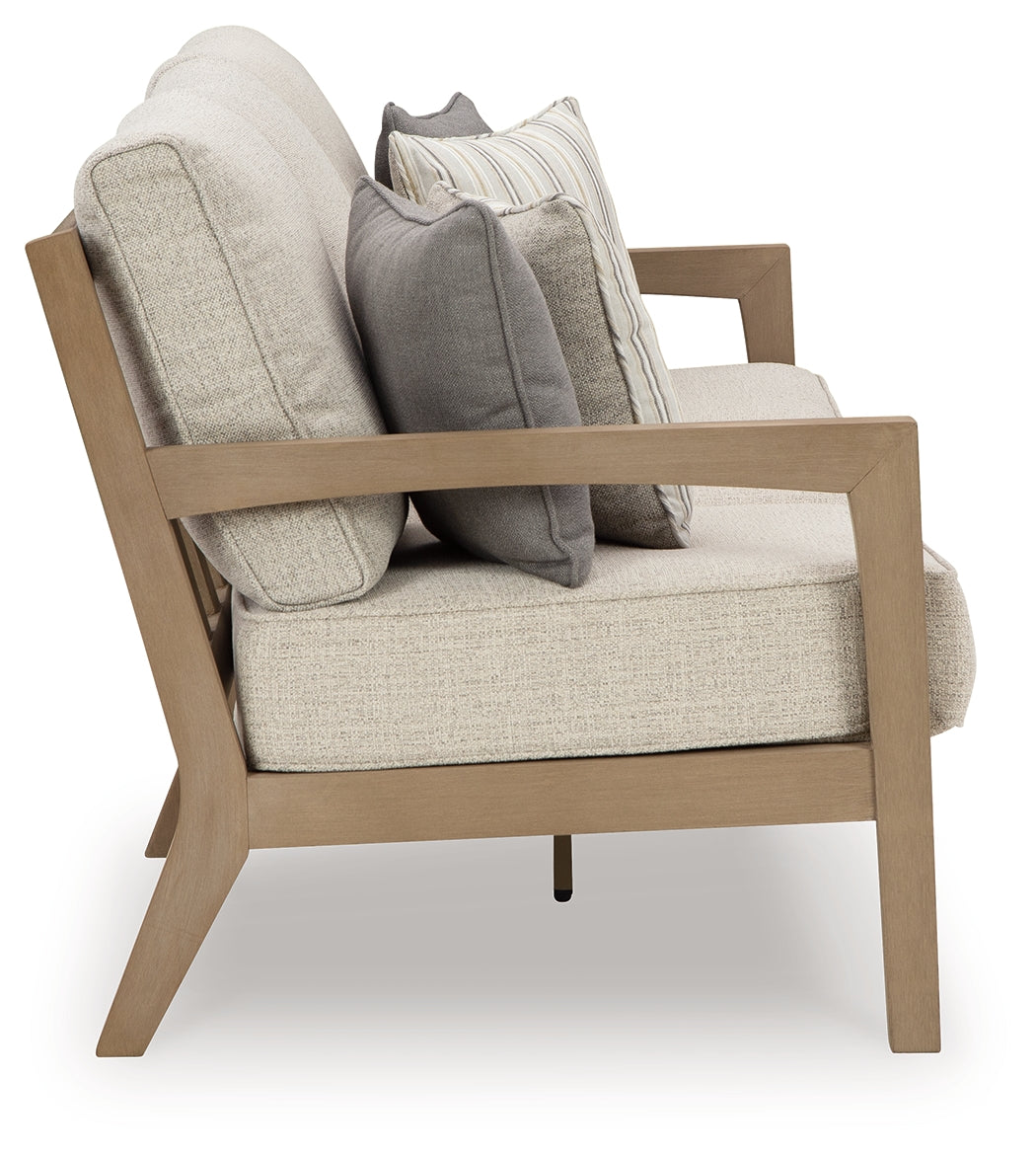 Hallow Creek Driftwood Outdoor Sofa with Cushion from Ashley Furniture - Luna Furniture