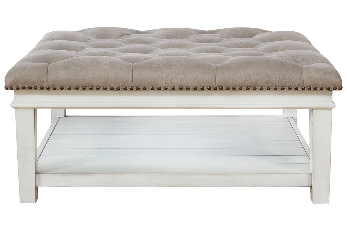 Kanwyn Whitewash Upholstered Ottoman Coffee Table from Ashley - Luna Furniture