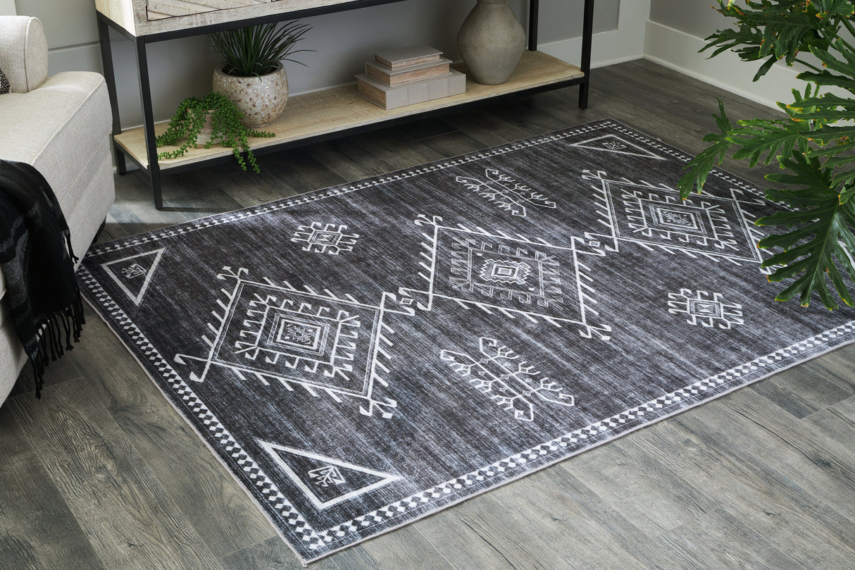 Arloman Black/Cream/Gray 5' x 7' Rug from Ashley - Luna Furniture