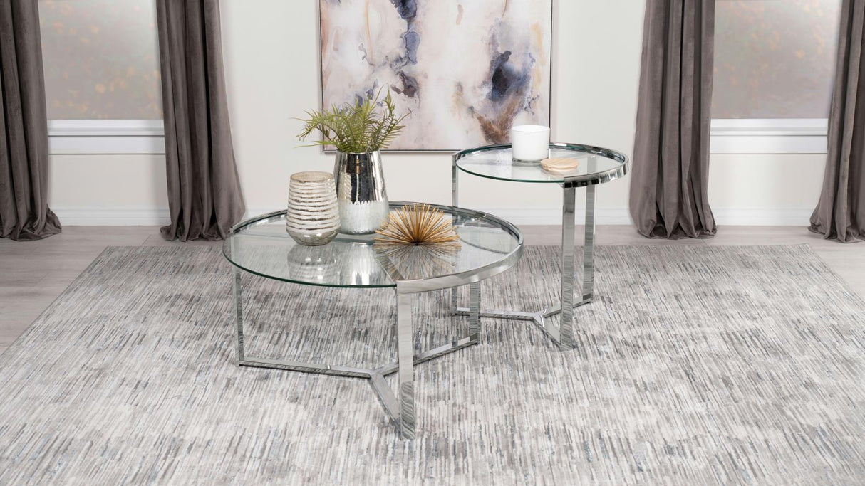 Delia Clear and Chrome 2-Piece Round Glass Top Nesting Coffee Table from Coaster - Luna Furniture