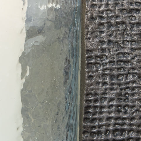 Garekton Clear/Pewter Finish Candle Holder from Ashley - Luna Furniture