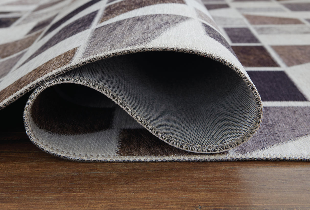 Jettner Multi 7'10" x 10' Rug from Ashley - Luna Furniture