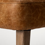 Niles 22.5L x 24.0W x 32.0H Brown Faux Leather Seat W/Brown Wooden Legs Wingback Dining Chair from Mercana - Luna Furniture