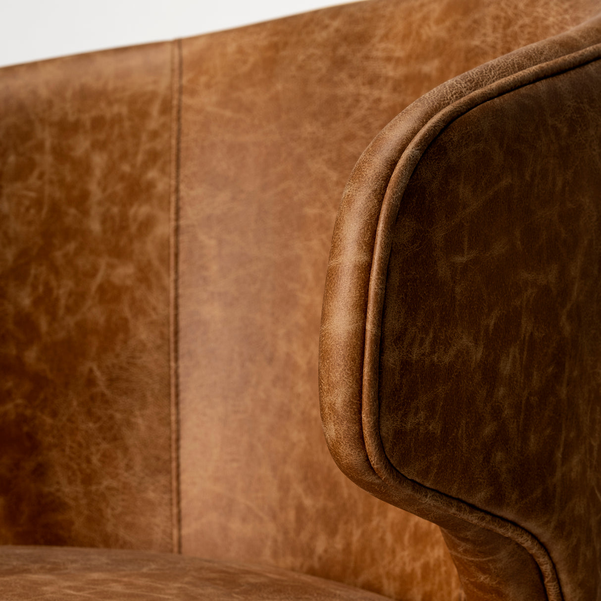 Niles 22.5L x 24.0W x 32.0H Brown Faux Leather Seat W/Brown Wooden Legs Wingback Dining Chair from Mercana - Luna Furniture