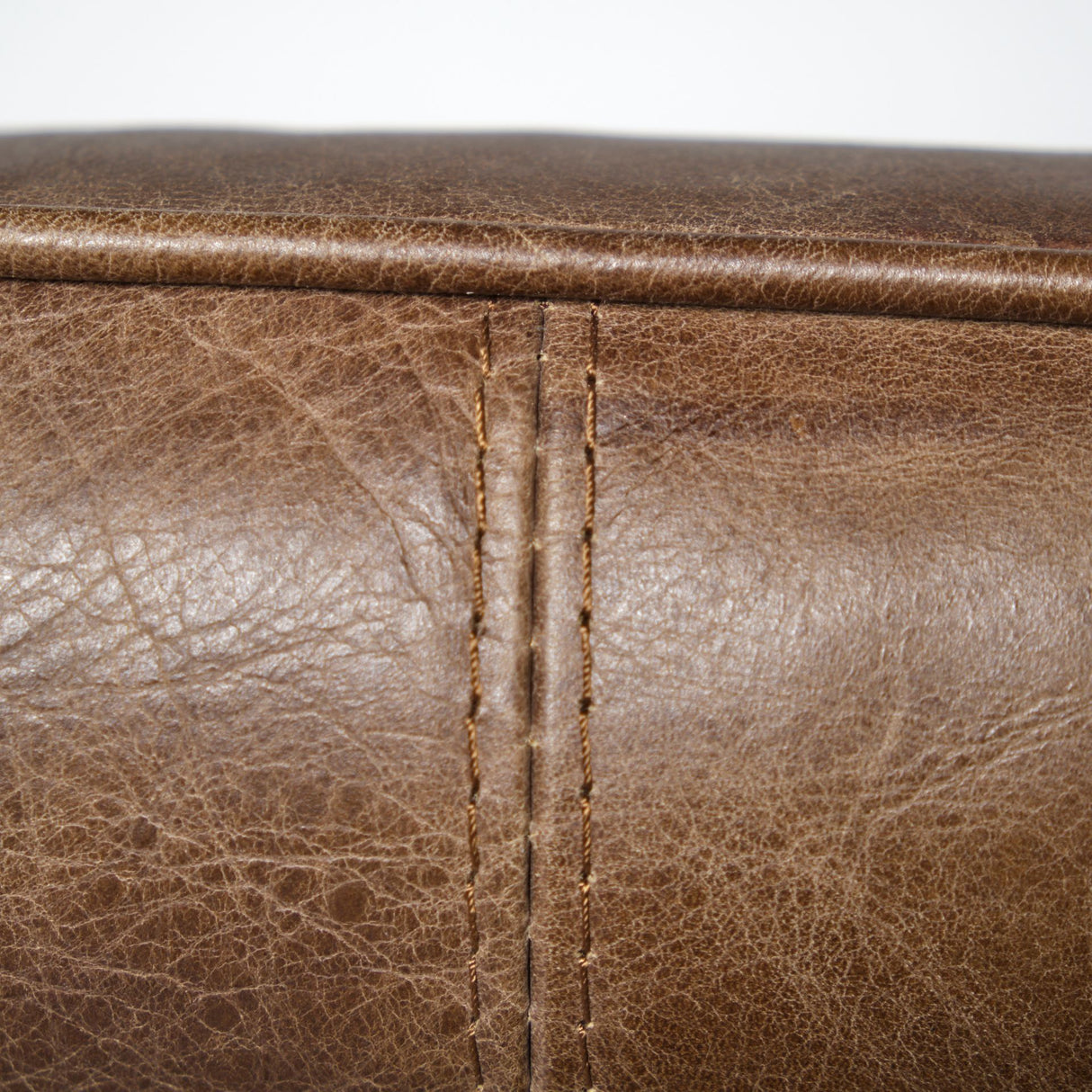 Flavelle I Brown Leather Cushion Seat and Solid Iron Base Accent Chair from Mercana - Luna Furniture