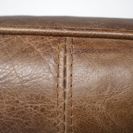 Flavelle I Brown Leather Cushion Seat and Solid Iron Base Accent Chair from Mercana - Luna Furniture