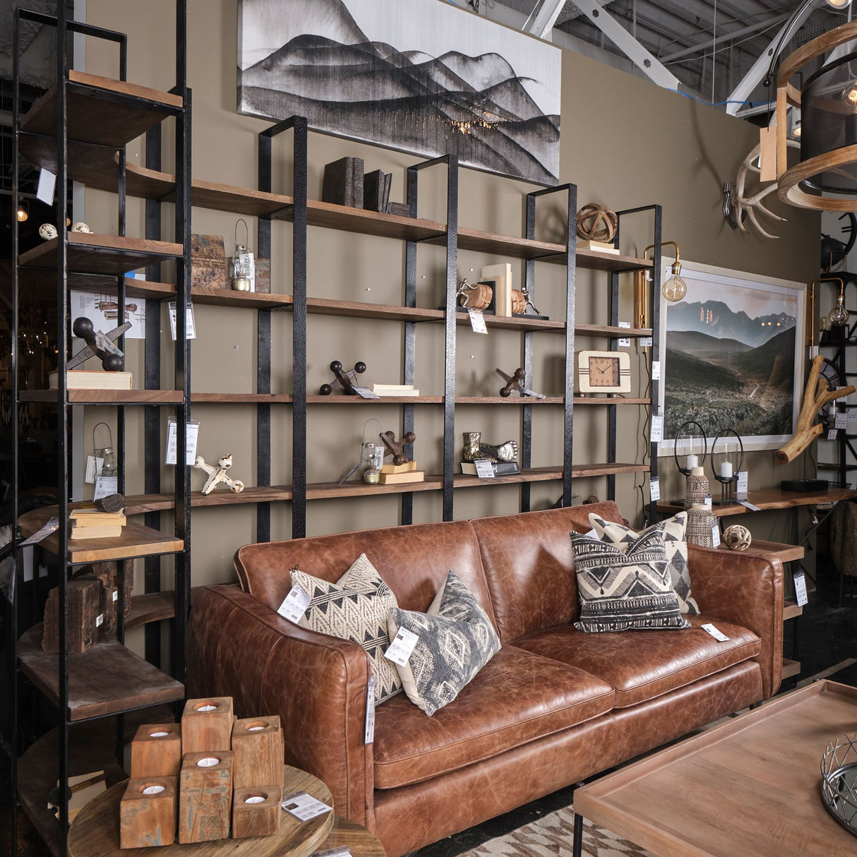 Turner II 37L x 10.5W x 90H Curved Dark Brown Wood And Black Iron Six Shelving Unit from Mercana - Luna Furniture