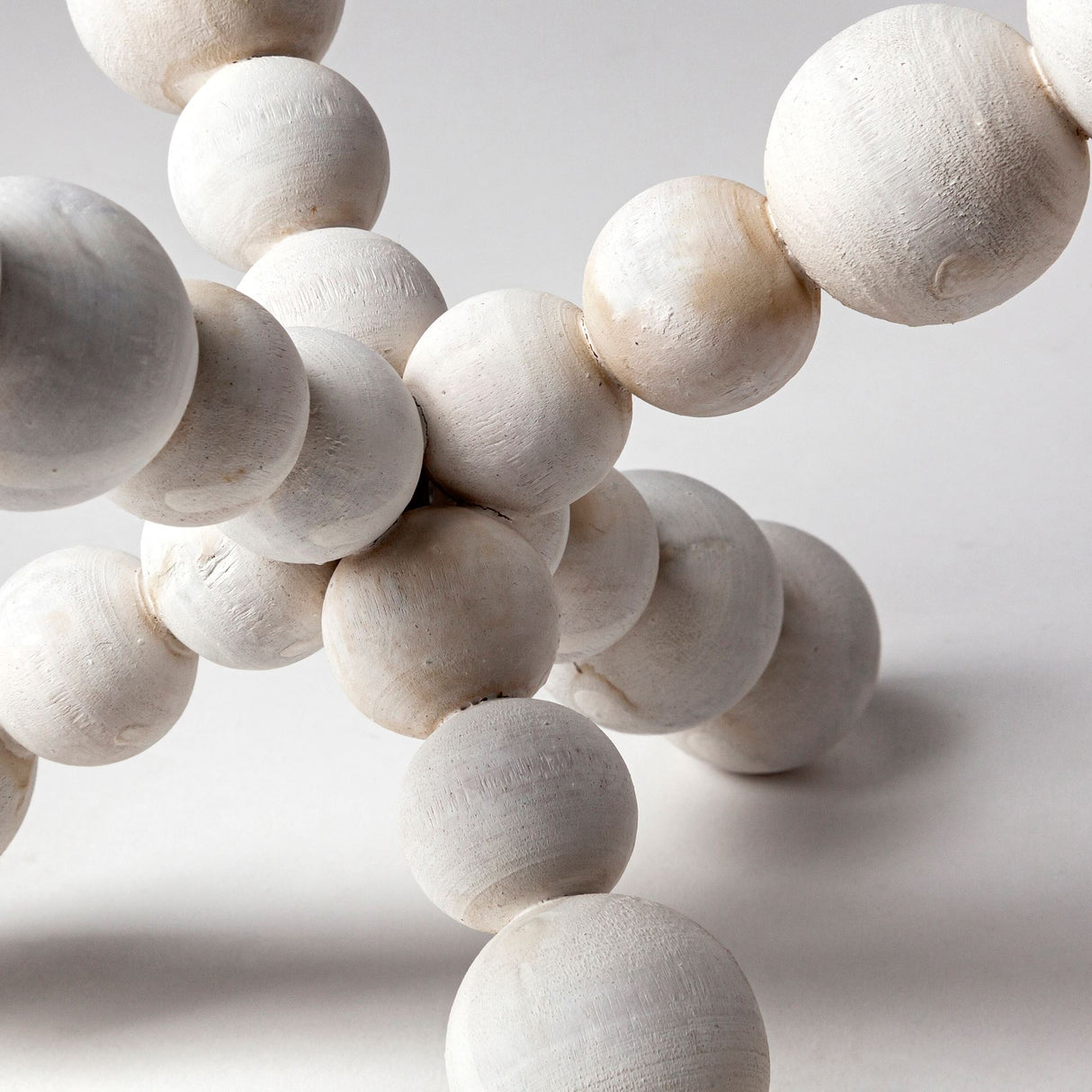 Carrollton II (Large) 9L x 9W Off-White Geometric Wood Ball Jack from Mercana - Luna Furniture