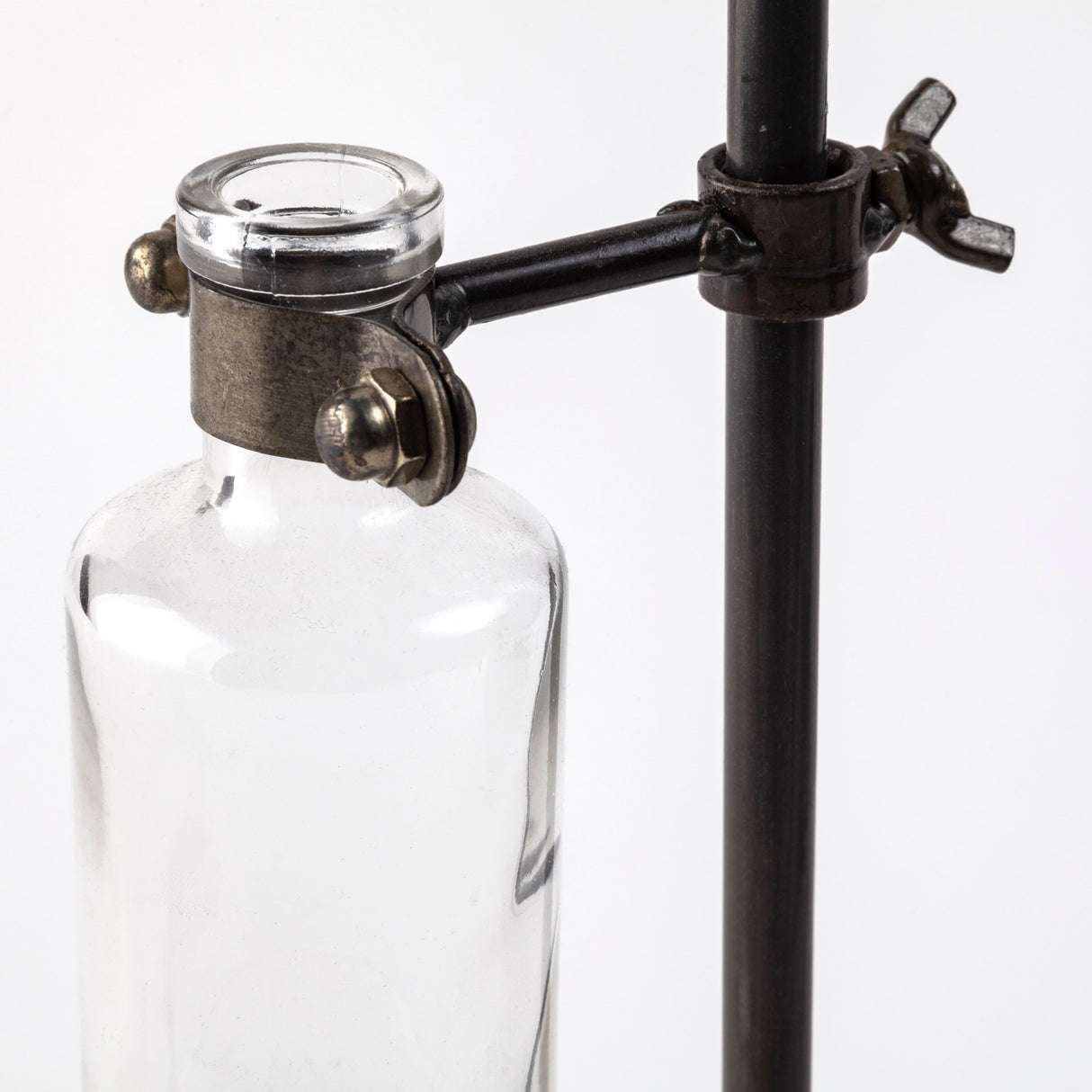 Jarvis Set of Five Dark Brown Metal and Glass Chemistry Inspired Bottles from Mercana - Luna Furniture