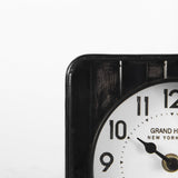 Karl 6.0L x 3.0W x 6.8H Rustic Black Iron Rounded Square Table Clock from Mercana - Luna Furniture