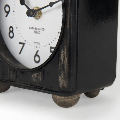 Karl 6.0L x 3.0W x 6.8H Rustic Black Iron Rounded Square Table Clock from Mercana - Luna Furniture